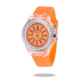 Detailed view of orange silicone strap and transparent case with rhinestone bezel - Orange