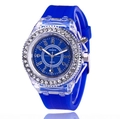 Close-up of blue silicone strap watch with rhinestone bezel and transparent case - Blue