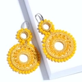 Handcrafted yellow bead woven double hoop earrings with bohemian style dangling drop design - Yellow