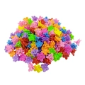 Macro shot of colorful mini flower hair claws in a mixed set for kids' hair styling - Plum Blossom Style