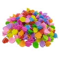 Detailed view of colorful shell shaped mini hair claws for kids in vibrant pastel colors - Shell Style