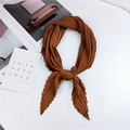 Brown pleated diamond scarf with caramel tones and elegant accordion folds on white - Caramel color