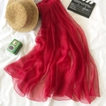 Lightweight red silk beach shawl and sun protection scarf for women on white background - Burgundy