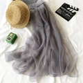Lightweight grey sun protection silk scarf for women styled with beach accessories - Light Gray