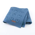 Blue knitted baby blanket featuring hollow heart patterns and a small leather brand tag - 100*80 / Denim Blue