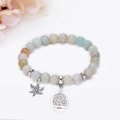 Detail showing natural stone beaded bracelet with tree of life and flower pendants - Light Green and Beige Mixed Style (Style 4)