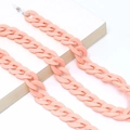 Detail shot of chunky peach pink acrylic chain link on a book with a clean white background - Peach Pink (15)