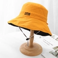 Detail of yellow sun hat with black 'one' embroidery and adjustable windproof drawstring - M (56-58cm) / Yellow and Black Double-Sided