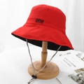 Macro detail of red fisherman hat featuring 'one' embroidery and adjustable windproof cord - M (56-58cm) / Red and Black Double-Sided