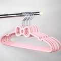 Pink heart-shaped bow plastic clothes hanger with non-slip notches and metal hook - Pink Bow Shape