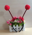 Red and black striped insect antenna headband with fluffy pom-poms for party costume - Large Red Furry Ball