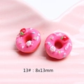 Macro detail of 8x13mm pink resin donuts with strawberry topping for DIY crafts - 13# Dotted Strawberry - Rose Red
