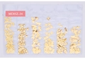 Close-up of golden metal nail art studs featuring moon, star and heart shapes in a case - Star Moon Cross Style (MDHZ-24)