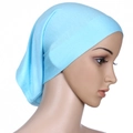 Detail of light blue soft mercerized cotton turban cap shown on a mannequin head - Cornflower Blue