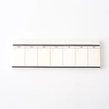 Minimalist weekly planner notepad with monochrome grid design and seven day columns - Weekly Plan