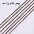 Detailed close-up of parallel antique bronze metal chains with dense link structures - Antique Bronze