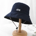 Detail of dark blue bucket hat with one embroidery and adjustable grey drawstring - M (56-58cm) / Navy Blue and Black Double-Sided