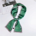 Emerald green satin twilly scarf with elegant horsebit pattern and purple piping detail - Chain Link Print Emerald Green