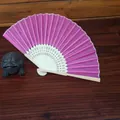Rose pink folding fan with hollow bamboo ribs and a matching organza drawstring pouch - 6*26CM / Rose Red