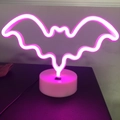 Pink bat-shaped neon decorative lamp with a white round base and manual switch - Bat (Pink) With Base
