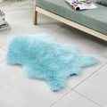 Plush light blue irregular rug for living room and bedroom shown in a cozy home setting - Irregular Light Blue
