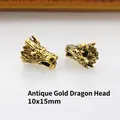 Detailansicht der antiken Gold-Drachenkopf-Perlen für DIY-Schmuck mit 10x15mm Maßen - Antik-Gold Drachenkopf