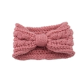 Close-up of pink knitted bow headband showing thick texture and soft weaving detail - Dusty Pink