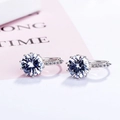 Elegant silver hoop earrings with round zircon stones in classic six-prong setting - White
