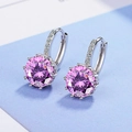 Elegant silver hoop earrings featuring a brilliant round pink gemstone and white diamonds - Pink