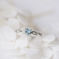 Elegant heart-shaped light blue zircon ring with silver finish and infinity motif - US 6 / White Gold With Blue Zircon