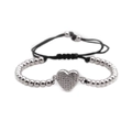 Pulsera con dije de corazón plateado con circonitas cúbicas y cordón negro ajustable - Oro Blanco