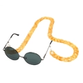 Detail of amber acrylic chunky eyewear chain connected to black sunglasses with metal links - Amber Orange (9)