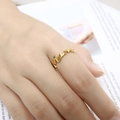 Elegant gold-plated Mama letter ring for women on a minimalist white background - Ring / Gold