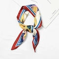 Silky scarf with elegant red and blue chain patterns tied in a stylish knot - Wheat Buckle Wine Red Edge