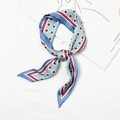 Blue silk scarf with pink polka dots and burgundy geometric border tied in a stylish knot - Double-Sided Dots Blue Edge