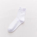 Classic white crew socks with ribbed cuffs made of soft cotton for all seasons - One Size / White