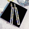 Macro shot of silver-toned rectangular earrings with full rhinestones on jewelry box - Long Rectangle Full Rhinestone Earrings (Silver Needle-Silver) / Silver
