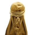 Close-up of the smooth golden velvet fabric and back knot detail of this luxury durag - Adjustable / Gold