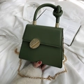 Dark green leather handbag with unique knotted handle and gold metal buckle detail - Green