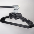 Set of 10 black bow-shaped non-slip plastic hangers with sturdy metal hooks - Black Bow Shape