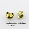 Detail of 11x11mm antique gold bear charms with hollow back for DIY jewelry making - Antique Gold Bear