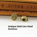Macro detail of antique gold lion head bead with crown for DIY jewelry 9x12mm - Antique Gold Crowned Monkey Head