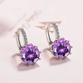 Elegant silver hoop earrings featuring round purple zircon and micro-pave diamond accents - Purple