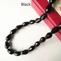 Macro detail of faceted black glass teardrop beads for DIY jewelry and accessories - 3*5mm / Black