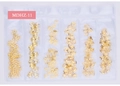 Detailed view of six gold metallic nail art charms including snowflakes and shells - Snowflake Five-Petal Flower Style (MDHZ-11)