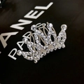 Sparkling silver crown hair clip for girls with pavé set white rhinestones on black background - Small Crown No.6
