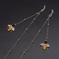 Elegant gold metal glasses chain with colorful rhinestone bee charms and rubber loops - Bee