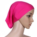 Pink mercerized cotton ninja inner cap for women shown on a model against white background - Rose Red