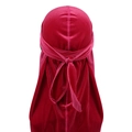 Detail view of the seamless velvet durag straps and soft texture in deep red pink - Adjustable / Rose Red
