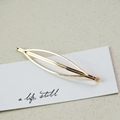 Elegant gold hollow leaf-shaped hair clip in minimalist metal alloy for women - Waterdrop (3530)